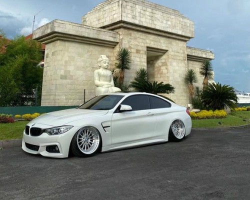 White BMW F32 cambergang is pretty and charming
