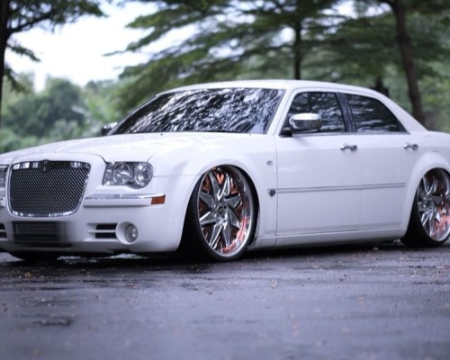 Reimagining Elegance: Chrysler 300C Transformed by the Camber Gang